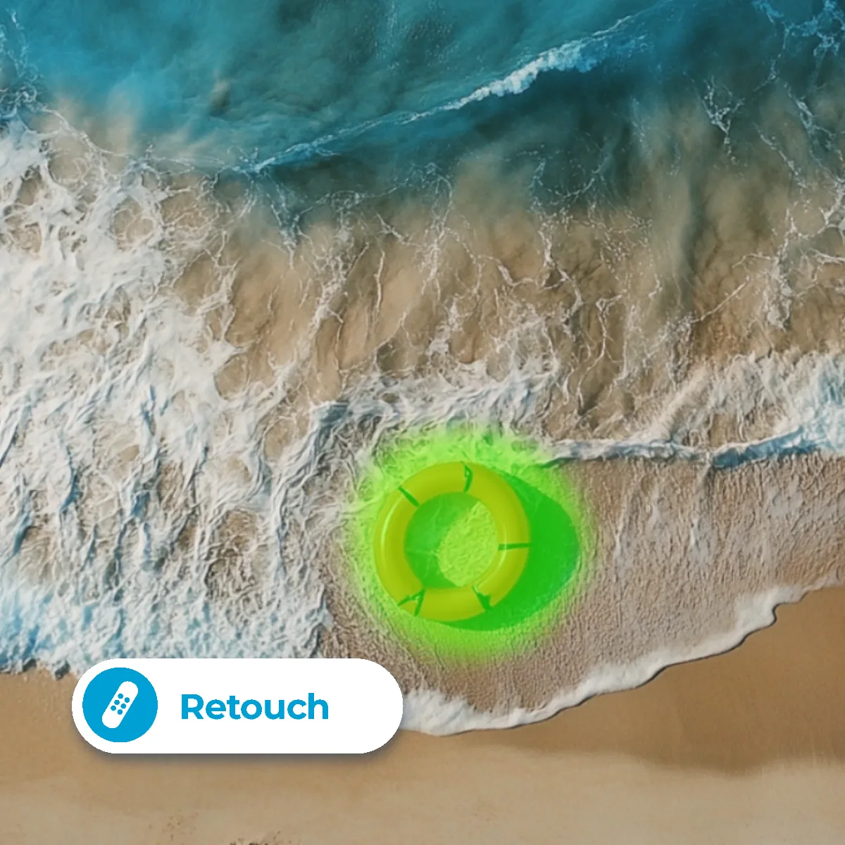 An aerial view of a sandy beach with waves, featuring a bright yellow life ring highlighted in green.