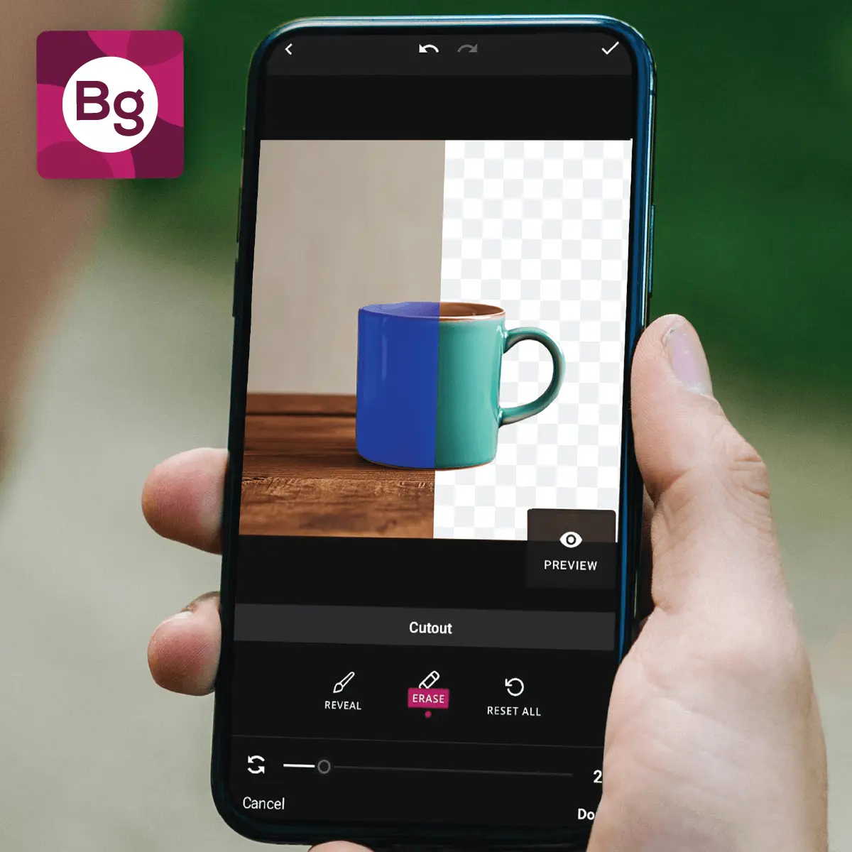 Hand holding a smartphone editing an image of a blue mug with a background removal app.